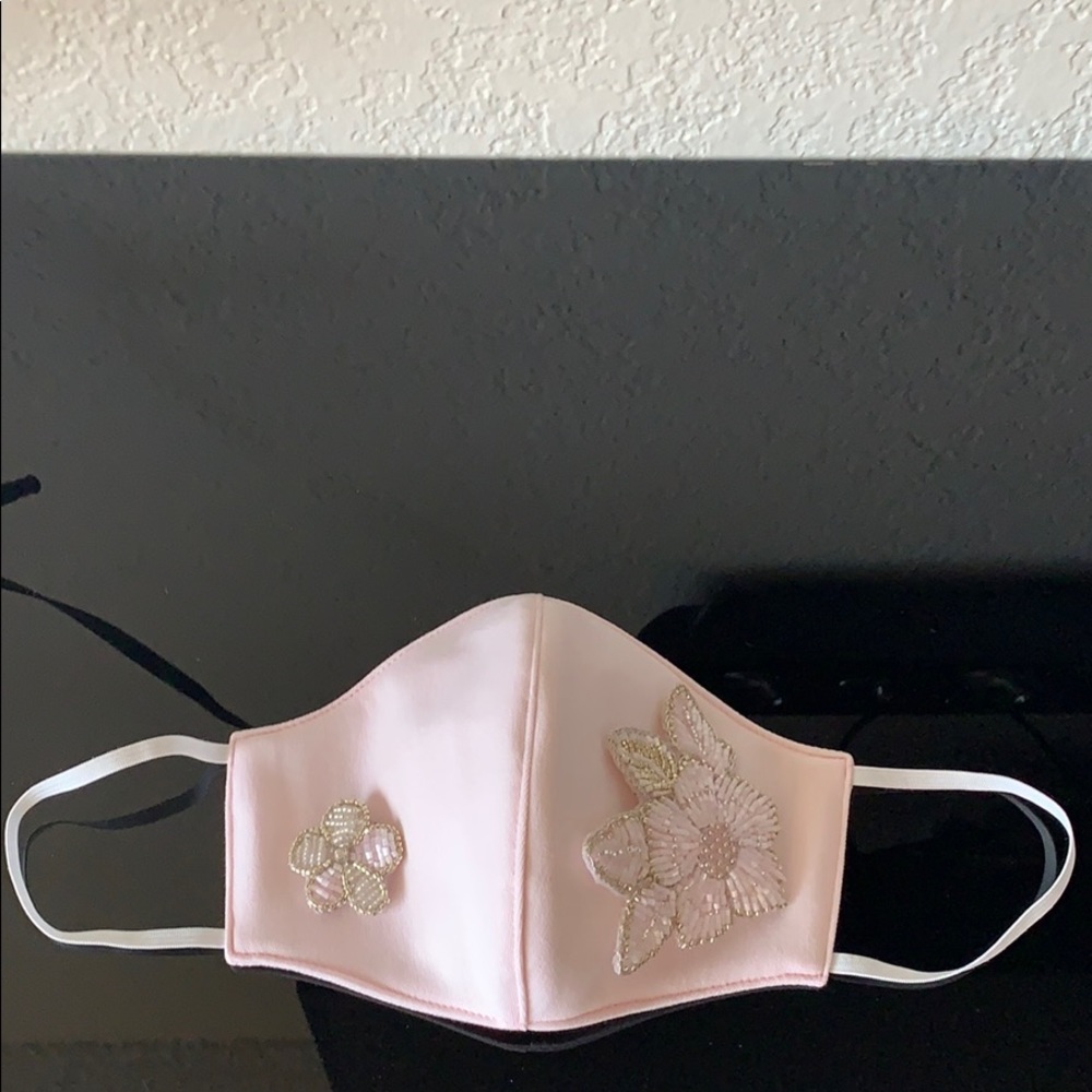 Handmade face mask. Hand embroidered